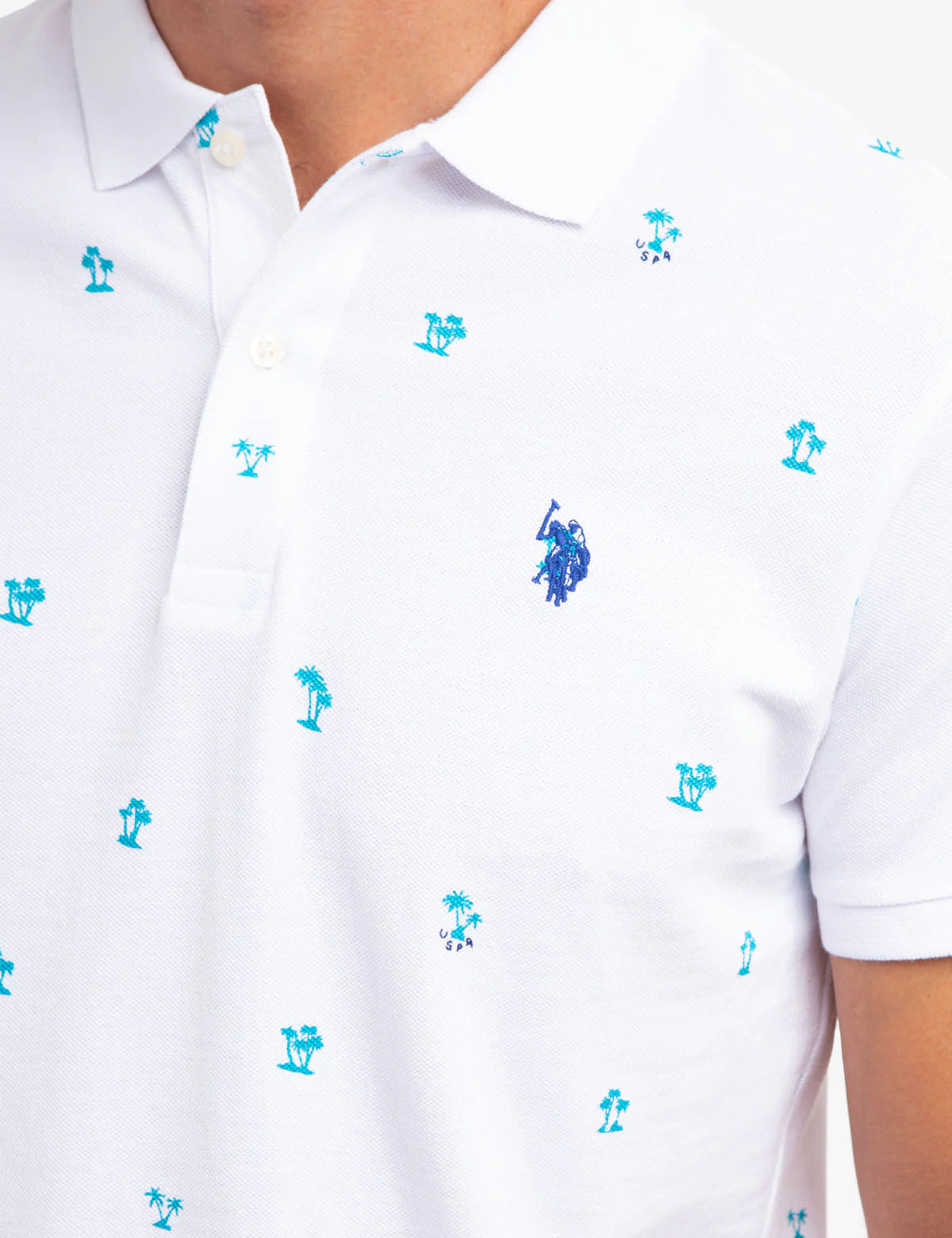 Polo en piqué à imprimé palmiers