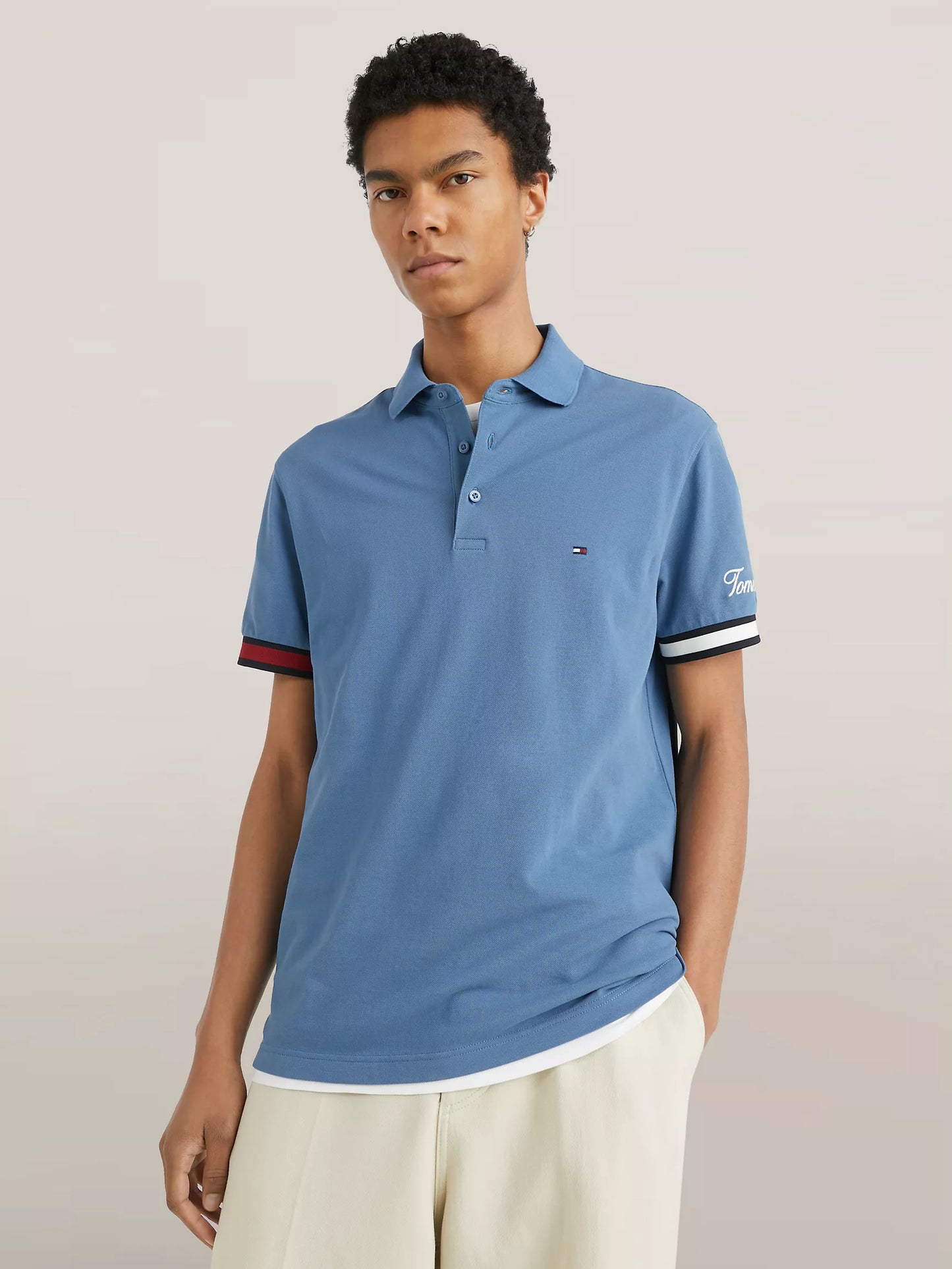 Polo coupe slim avec poignets à liseré drapeau