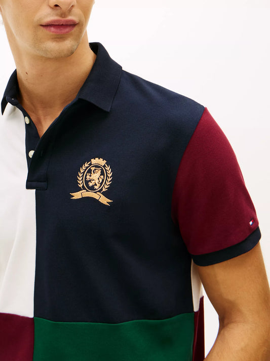 Polo en piqué stretch colorblock avec logo écusson Navy