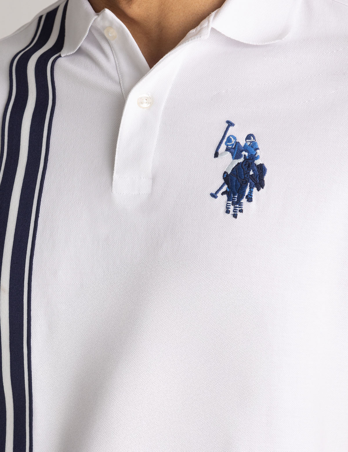 Polo en piqué avec bandes verticales